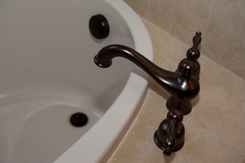 Inspect plumbing - Showalter Property Consultants